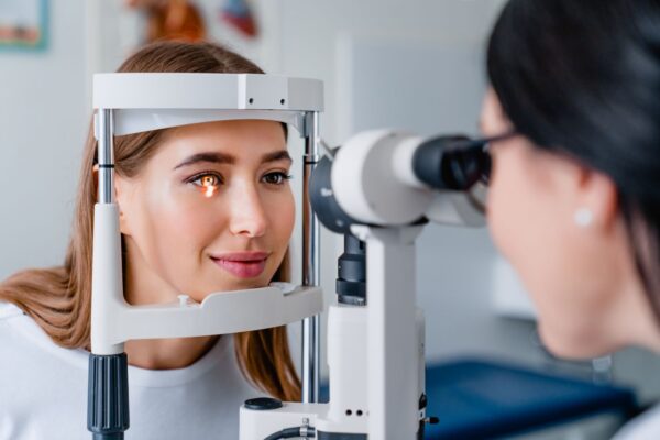 eye-doctor-with-female-patient-during-an-examinati-2022-05-31-02-23-21-utc